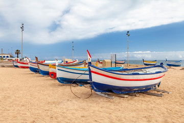 Naklejka premium fishing boats on the coastline of the sea