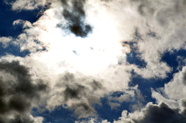 Obraz premium Clouds in the sky. The sun shines through the clouds.