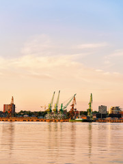 Naklejka premium Loading cranes and ship in Baltic sea in Klaipeda