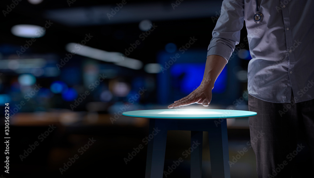 Wall mural smart medical doctor hand with stethoscope working on modern table computer blank ui and ar computer