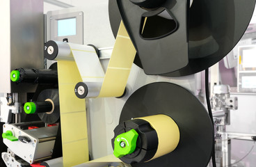 Fragment of the conveyor of the pharmaceutical labeling machine. Abstract industrial background.