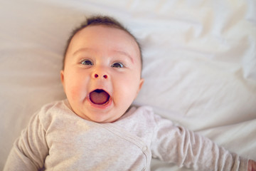 Portrait of a happy  little newborn girl