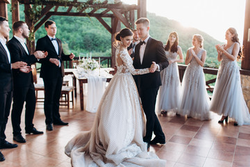 The first dance of the young. The bride and groom are dancing their first dance.