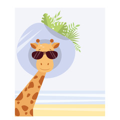 giraffe with sun glasses and a hat on the beach