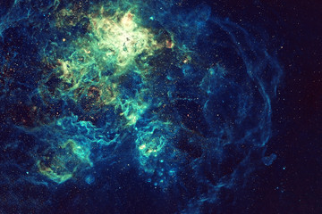 Beautiful space nebula of turquoise color Elements of this image furnished by NASA