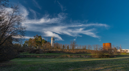 Water tower on hill over Trebic town in Moravia region in sunset evening