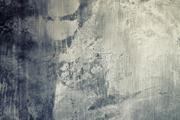 Abstract gray background with scratches and stains.