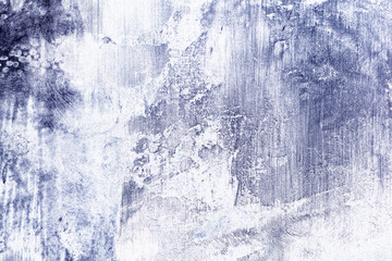 Abstract gray background with scratches and stains.