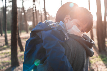 Father and son using air masks © Trendsetter Images