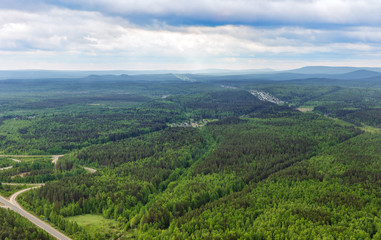 Fototapeta na wymiar Northern landscape. Endless forests aerial view