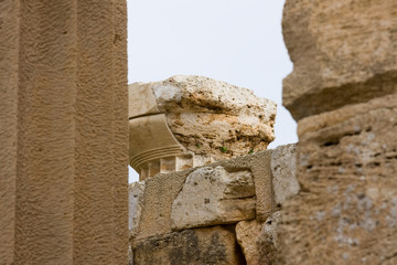 Close up on ruined columns of Athena or Aphrodite Temple in acropolis of Selinunte also called Selinus - ancient city on Sicily Island in Italy