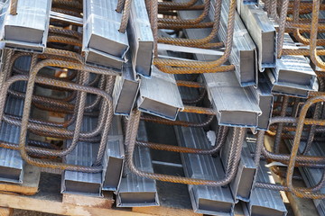 construction material closeup, metal parts with thick metal wires used for reinforcement 