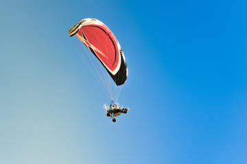 paraglider in the sky paratrike person