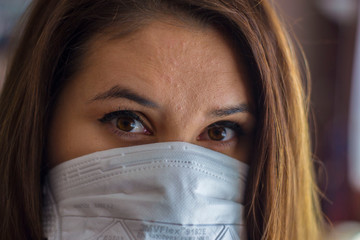 A woman in a mask during quarantine