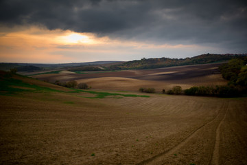 Fototapeta na wymiar Panorama of Moravian fields with beautiful clouds