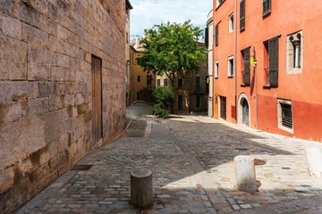 Girona, Spain, August 2018. Scenic view of the medieval street of the old city.