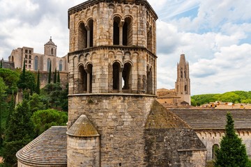 Fototapeta na wymiar Girona, Spain, August 2018. Closeup of the tower of an old catholic church.