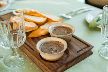 liver pate with toast on a Board