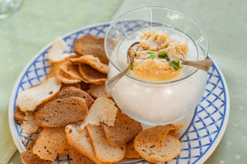Pike caviar with croutons, gourmet meal. Served table