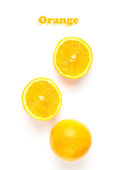 Creative layout made of halff of orange fruit. Set of fresh whole and cut orange on white background. Flat lay. Top view