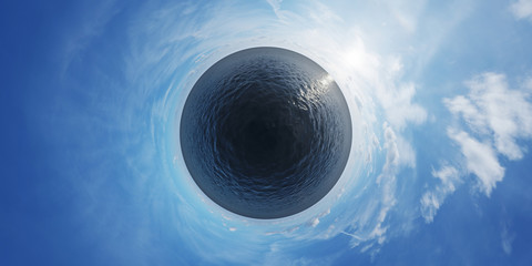 Small planet covered by ocean on blue sky. 
