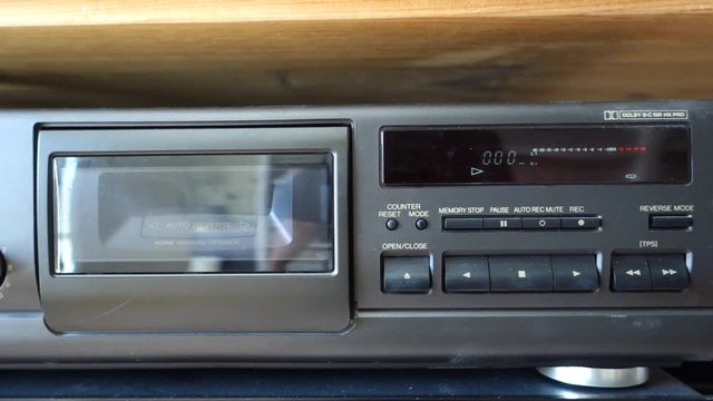 An audio cassette, a vintage object from many years ago that still works very well in a tape deck