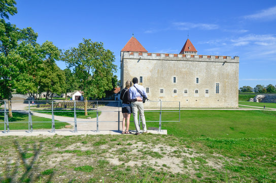 Tourists at the medieval kuressaare castle in Saaremaa, Estonia