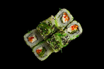 Japanese food: Set of salmon sushi and rolls with salmon and eel