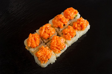 Japanese food: Set of salmon sushi and rolls with salmon and eel