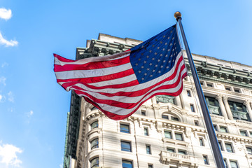 american flag of united states of america in the wind in manhattan, new york