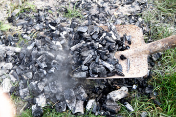 Collect coal with a shovel from the ground