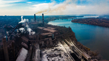 Obraz premium metallurgical production plant full cycle smoke from pipes bad ecology aerial photography