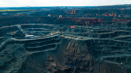 Aerial view of the Iron ore mining, Panorama of an open-cast mine extracting iron ore, preparing...