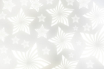 illustration of scattered White glowing stars on white background. Abstract white background. Celebration backdrop