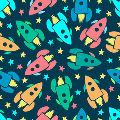 Multicolored cartoon rockets and stars in space isolated on a blue background. Side view. Baby seamless pattern. Vector hand graphic illustration. Texture.