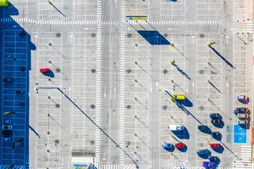 Parking Lot with some cars from above aerial drone view