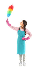 Little housewife with dust brush on white background