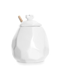 Jar with sweet honey on white background