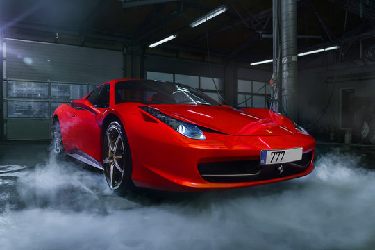 Ferrari 458 Spider At Carwash Box. Red Supercar At The Wash Service 