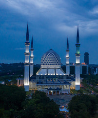 Aerial view of Sultan Salahuddin Abdul Aziz mosque, Shah Alam, Malaysia at dawn.