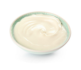 Bowl with tasty cream cheese on white background