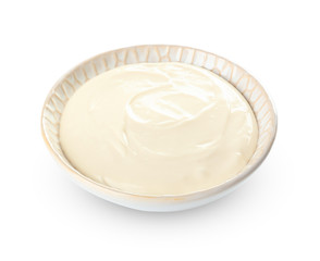 Bowl with tasty cream cheese on white background