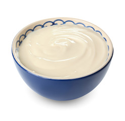 Bowl with tasty cream cheese on white background