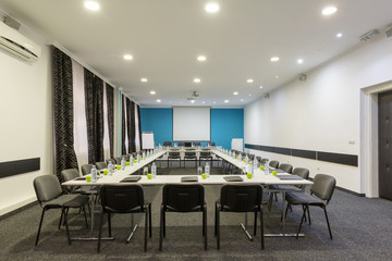 Interior of a conference room in hotel ready for a meeting