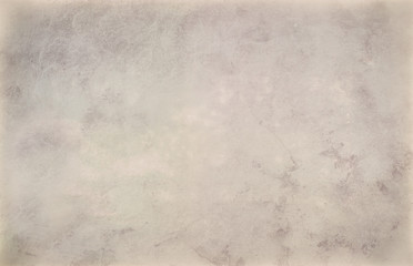 old brown and beige paper background texture with antique or vintage grunge border and marbled painted watercolor design with faded off white pale color that is blank, light tan distressed background 