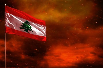 Fluttering Lebanon flag mockup with blank space for your text on crimson red sky with smoke pillars...