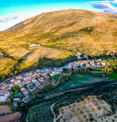 Riofrio village in Andalusia Spain near Granada. Loja district. Olive fields. Aerial. Sunset