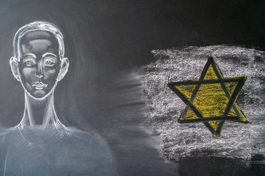 Portrait of a young guy on a chalk board. Holocaust Remembrance Day,