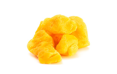 Pile of Cheddar Cheese Curds Isolated on a White Background