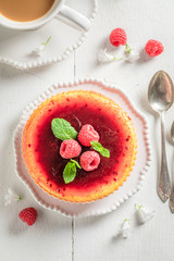 Homemade and tasty raspberry cheesecake made with fresh berries